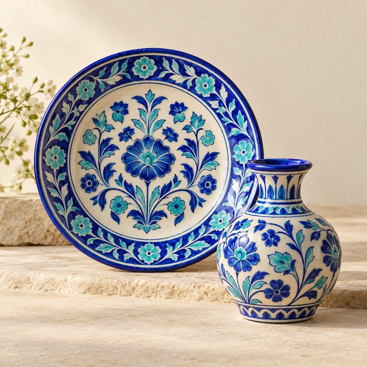 Blue and white ceramic plate and small vase with floral designs